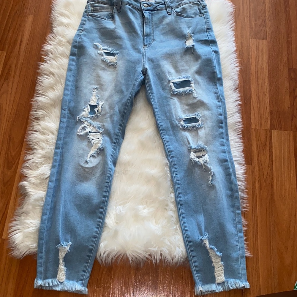 Brand new ripped light blue jeans